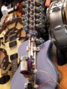 This guitar is being mechanically played